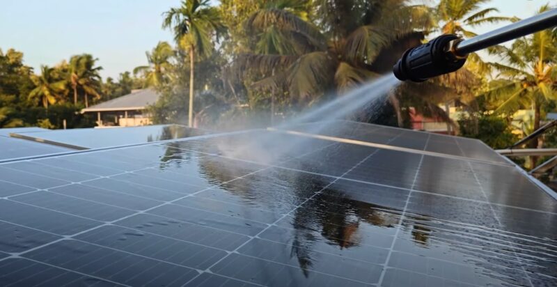 Washing solar panels with a pressure washer